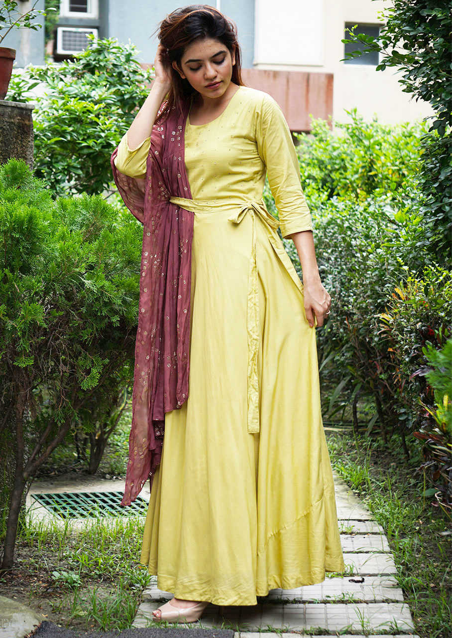 Capricious Dark Olive Green Colored Party Wear Embroidered Muslin Cotton  Silk Gown